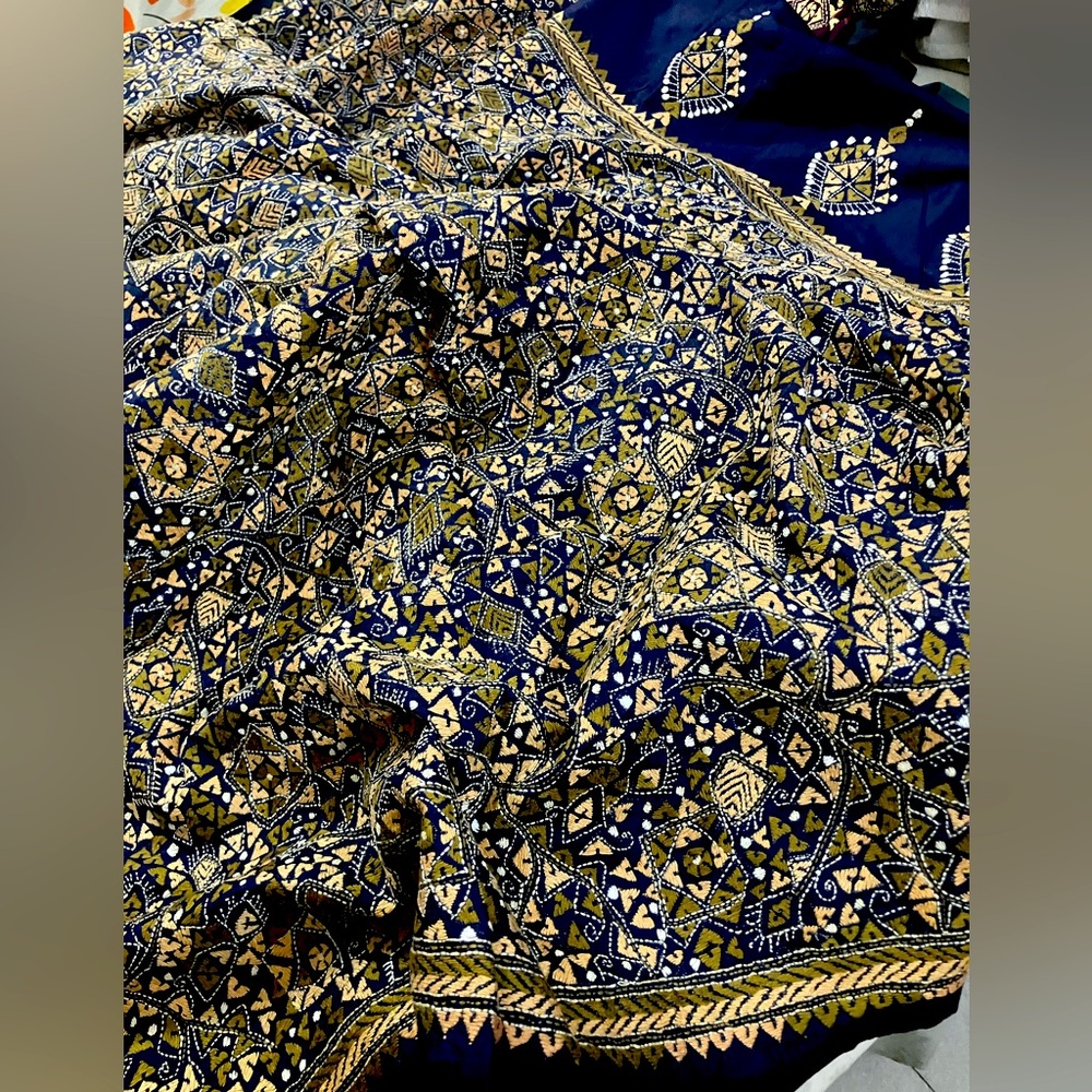 Intricate Blue and Gold Patterned Fabric